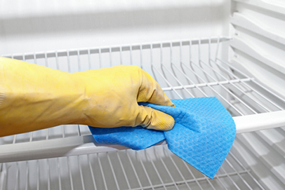 http://www.dreamstime.com/stock-photography-hand-protective-glove-cleaning-refrigerator-yellow-image35383102